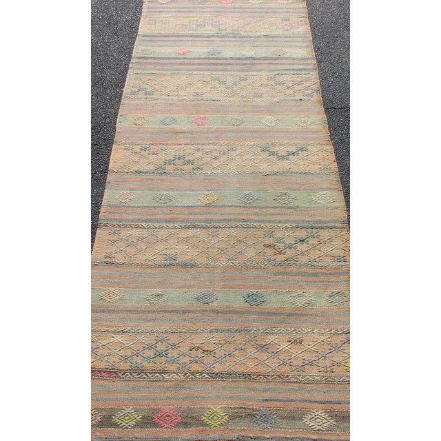 Mid 20th Century Vintage Turkish Kilim Runner With Geometric Shapes and Colorful Stripes For Sale - Image 5 of 11