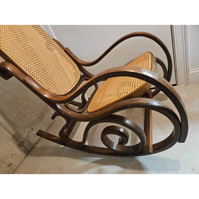 Lovely 40+ year old Bentwood Cane Rocking Chair. Was perfect for rocking babies in the latter 20th Century.