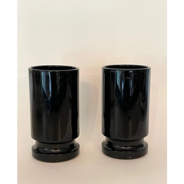 This is a pair of Vintage Black Glass Mugs attributed to the Indiana Glass Company. The color Black Amythest. These mugs...