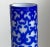 A luminous hand-carved cameo Peking Glass overlay vase in deep cobalt blue over milky white glass, created in China during...
