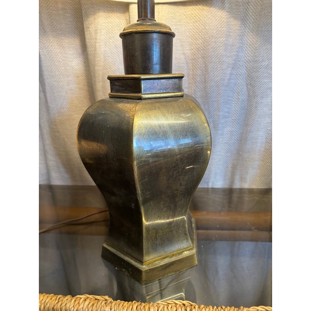 Exquisite vintage 1950s Hollywood Regency brass Chonoserie jar shaped table lamp. Lamp is 23” to top of socket and 30” to...