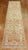 Turkish Anatolian runner with a simple multi medallion motif on a camel ground from the middle of the 20th century....