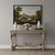 This is a heavily carved Italian console table with faux marbleized painted top. It is in very good condition. It has...