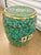 Chinese Enameled Porcelain Garden Seat with repeating foliates on green ground. Approx. 17"H and 12" diameter. No chips or...