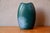 This large stoneware vase is truly unique, transporting us to the cosmic and organic world of 1970s West German design....