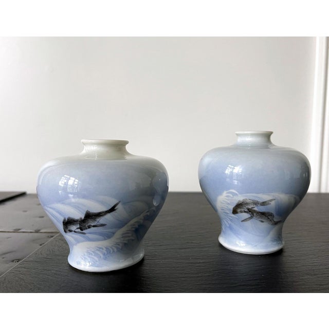 Two small nearly identical ceramic vases by Japanese Meiji imperial potter Makuzu Kozan (1842-1916), circa 1890-1900s. The...