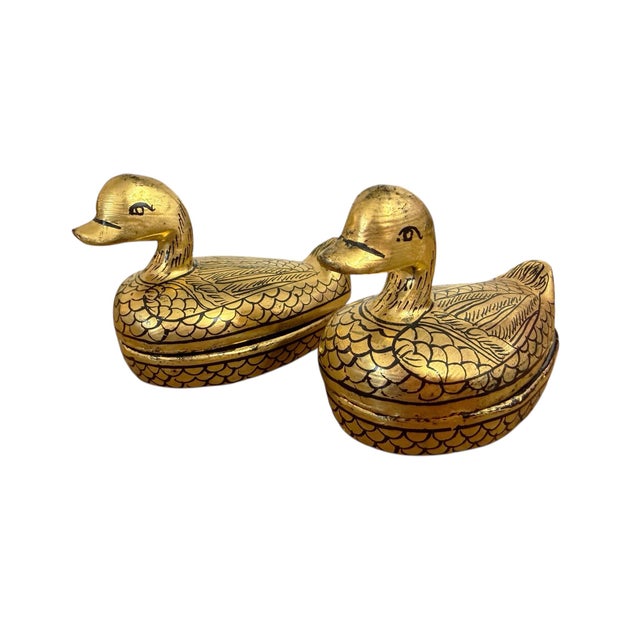 This charming set of two Burmese trinket boxes showcases traditional lacquerware craftsmanship, featuring a duck form...
