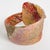 Sculptural Orange and Gold Plexiglass Coiled Bangle Bracelet For Sale - Image 4 of 9