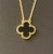 Authentic Van Cleef & Arpels Vintage Alhambra pendant in the shape of a clover, featuring a black onyx main stone set in...