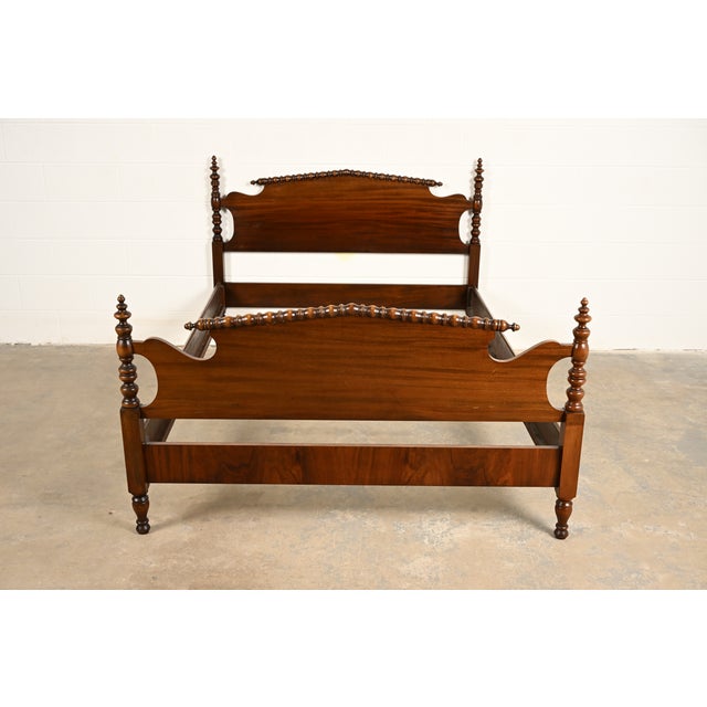 A gorgeous antique Early American or Colonial style full size poster bed By Berkey & Gay USA, Circa 1920s Beautiful carved...