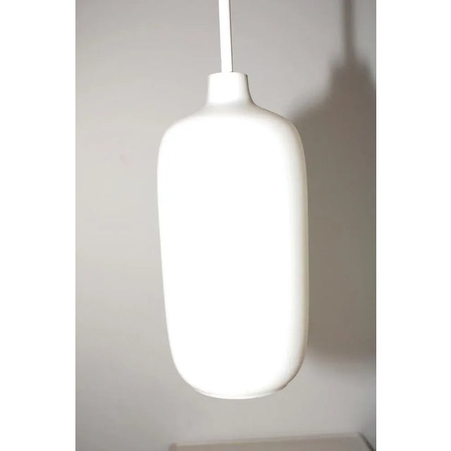 Hanging Light by J. T. Kalmar for Kalmar, 1950s, in Flawless conditions. Designed 1950 to 1959 I have official proof of...