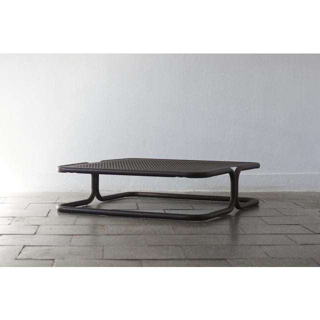 An elegant coffee table from the Marcel collection, designed by Chiaramonte & Marin for the Italian brand EMU, known for...