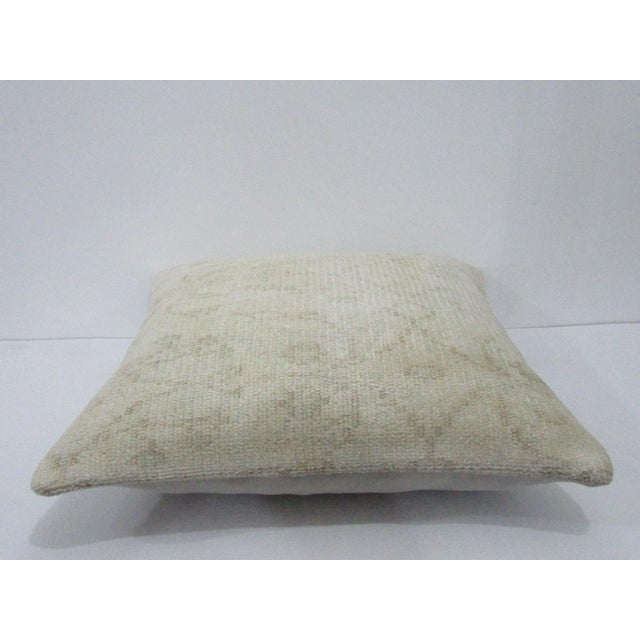Decorative pillow cover made from a vintage Turkish handknotted rug. Backed with good quality cotton fabric. Pillow...