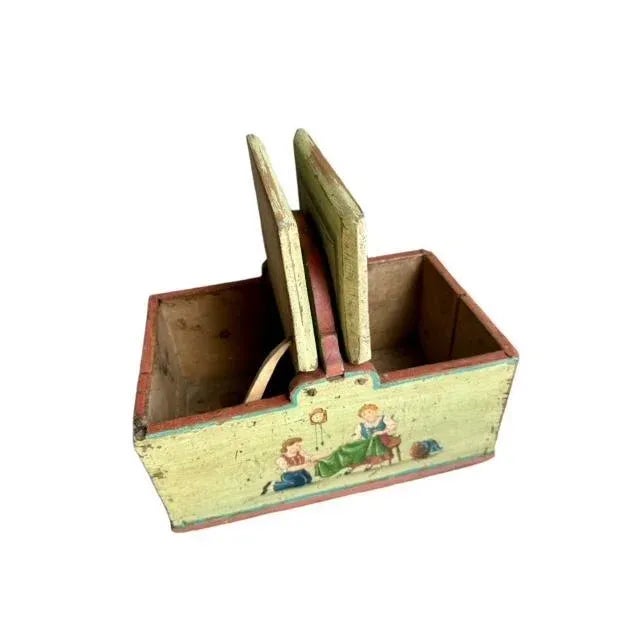 An early 1900s painted wood sewing box — Austrian folk art with charming hand-painted decoration. Measures 13.5"W x 8.5"D...