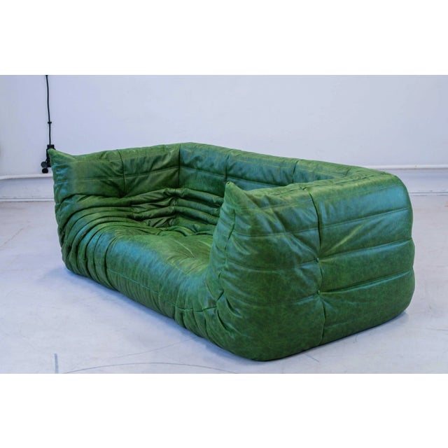 This Togo has been reupholstered with new foam and high-quality new fabric, keeping its inner structure giving the item...