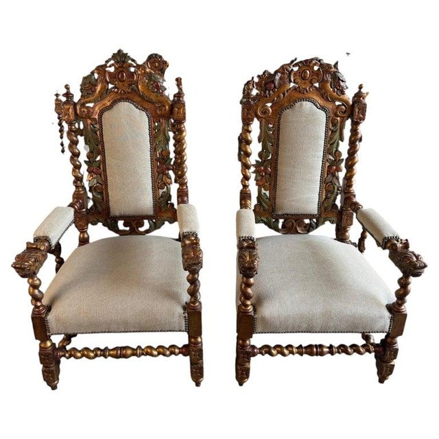 Monumental set of 10 Italian Renaissance Revival dining chairs, circa 1860-1880. Includes 2 armchairs with carved lion...