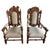 Monumental set of 10 Italian Renaissance Revival dining chairs, circa 1860-1880. Includes 2 armchairs with carved lion...