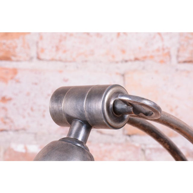 This elegant table lamp represents the pinnacle of French Art Deco design, dating back to the first half of the 20th...