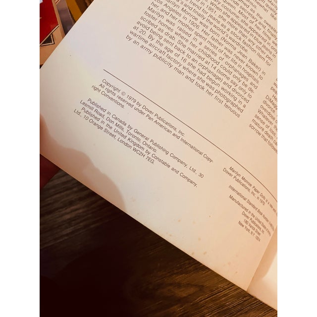 Tom Tierny Paper Doll Book featuring Marilyn Monroe. With 14 pages that have 2 outfits each, that’s 28 different Monroe...