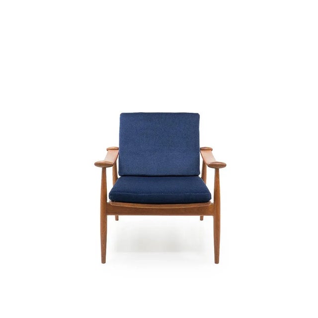 Our “Spade” armchair (named after the typical armrest design) originates from the early 1950s when France & Son was still...