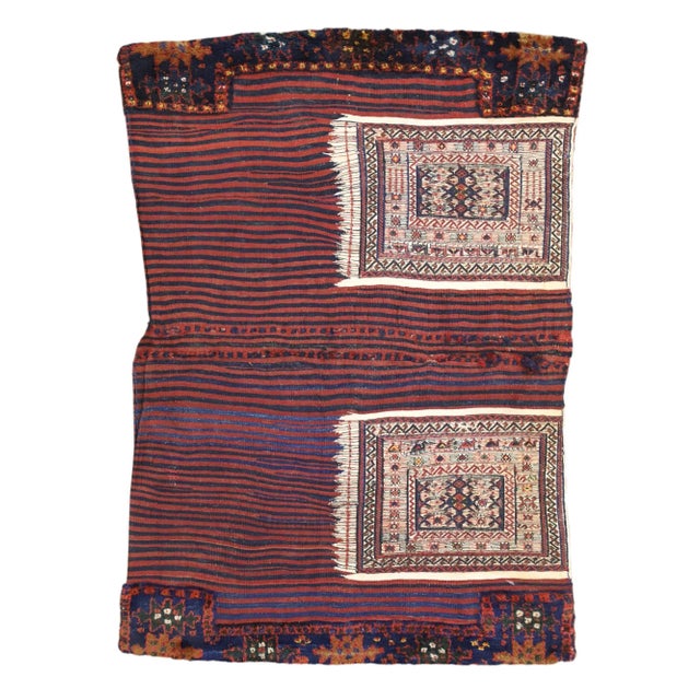 74584 Antique Persian Soumak Saddlebag, 03'05 x 05'02. Emanating nomadic charm with incredible detail and texture, this...