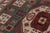 Late 20th Century Rug & Kilim’s Kazak-Inspired Rug, Tribal Geometric Patterns in Green & Red For Sale - Image 5 of 10