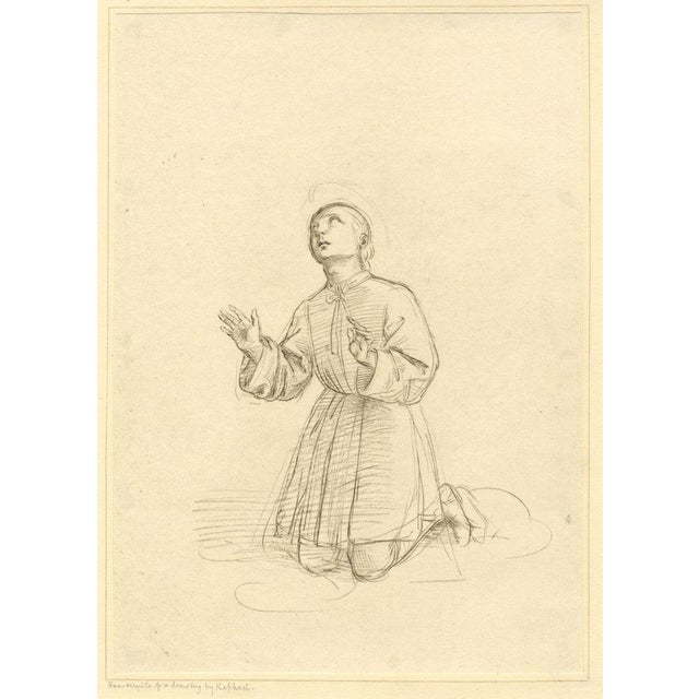 An original c.1818 engraving print Kneeling Figure of a Youth c.1503, Raphael Facsimile.This early 19th-century crayon...