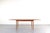 This teak table was manufactured in Denmark in the 1960s. It has been professionally and carefully restored by removing...