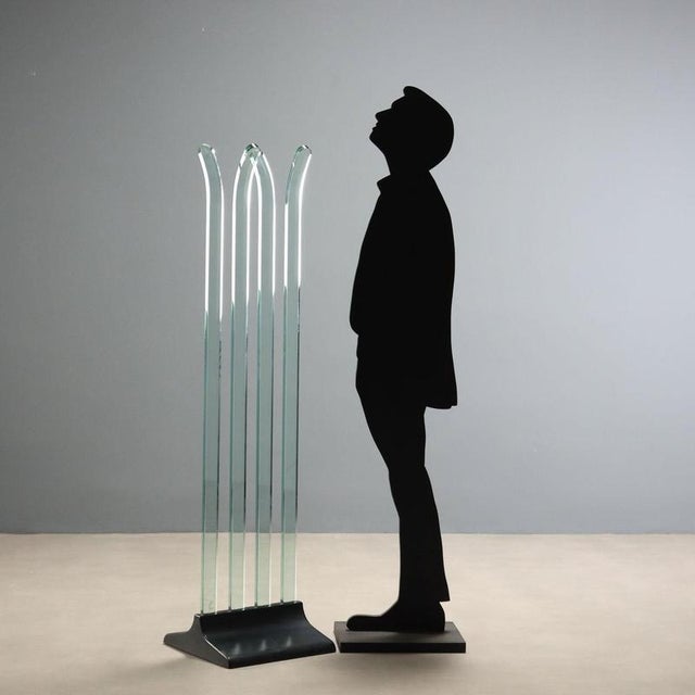 1970s-1980s glass coat rack, crafted by Fiam, featuring a sleek and modern design. The transparent glass structure is...