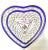 A charming pair of vintage porcelain heart dishes featuring open latticework, cobalt blue rims, and delicate hand-painted...