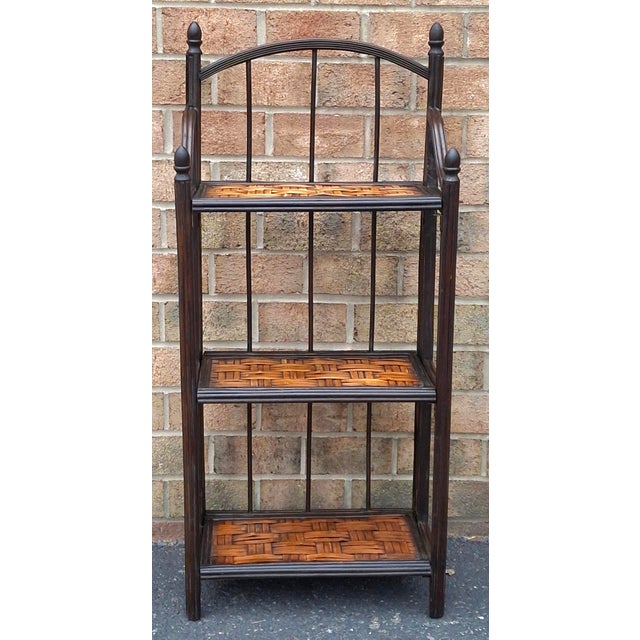 A Mid-Century Modern Rattan and Split Reed Folding Bookcase Étagère, Circa 1960s Measures 20" in width, 10.5" in depth and...