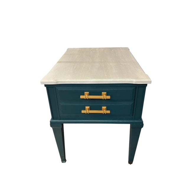 Beautifully refinished in a rich jewel-tone teal, this vintage side table offers a fresh interpretation of classic design....