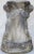 Two cherubs on each pedestal appear to be holding the pedestal up to display your treasures. They are clothed in drapes...