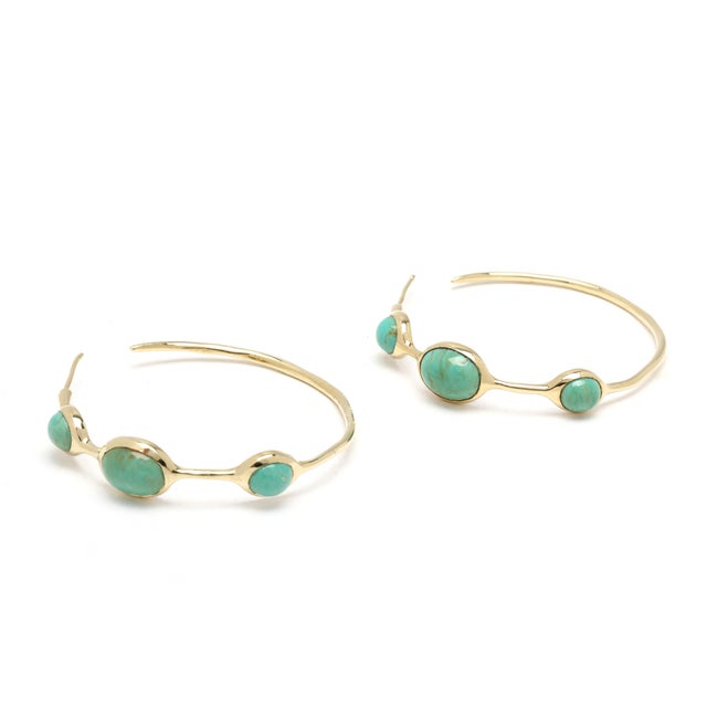 Stones: turquoise oval cab Length: 1.5 in. Weight: 5.1 dwts. / 7.9 grams Stamps: "18k Ippolita" *1 earring w/ repair...