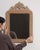 This mirror makes its impression through natural oak carved crest, small. It was made in France during 1900s, a lineage...