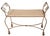 Stylish, chic and voguish gold finish, twisted rope form frame, with decorative metal tassel feet, and a rectangular pad...