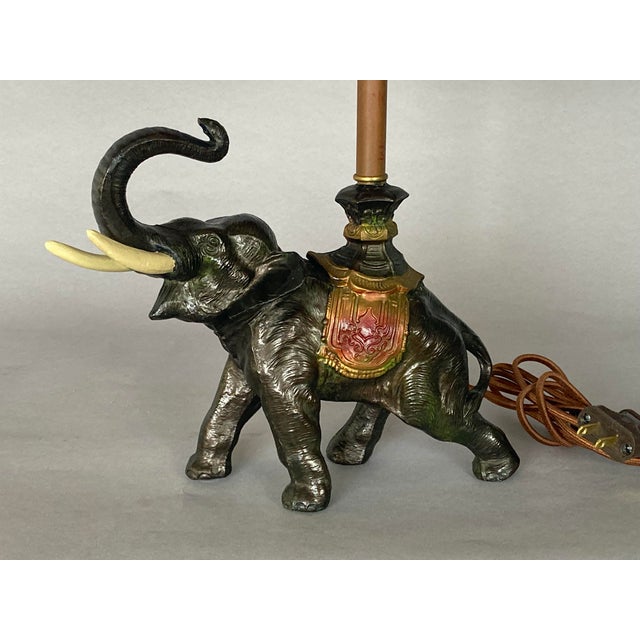 Cute attack! Our adorable elephant lamp, most likely 1920 vintage, is made of spelter (white metal) with its original...