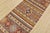 A tribal Khorjin runner hand-knotted with fine wool on a cotton foundation. This rug features multicolored stripes adorned...