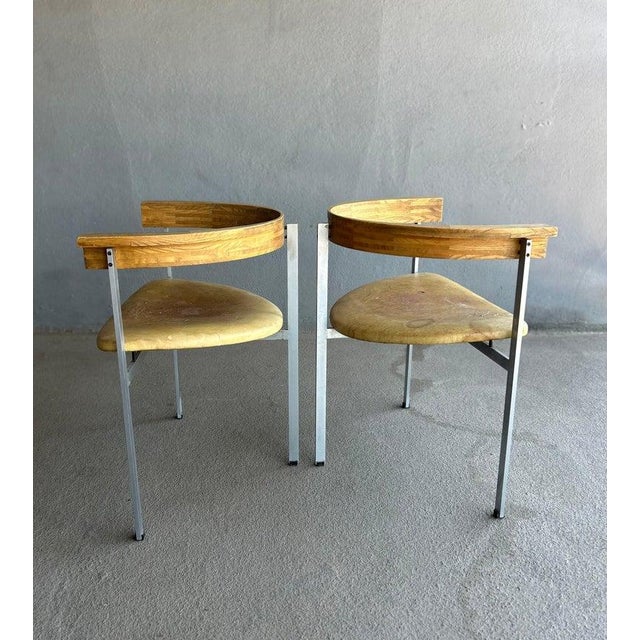 Pair of all original PK 11 chairs by Poul Kjærholm for E. Kold Christensen. These chairs retain their Georg Jensen labels...