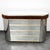 Fantastic 1970s bar cabinet with a curved mirror design and brown velvet detailing. Includes a mini fridge and additional...