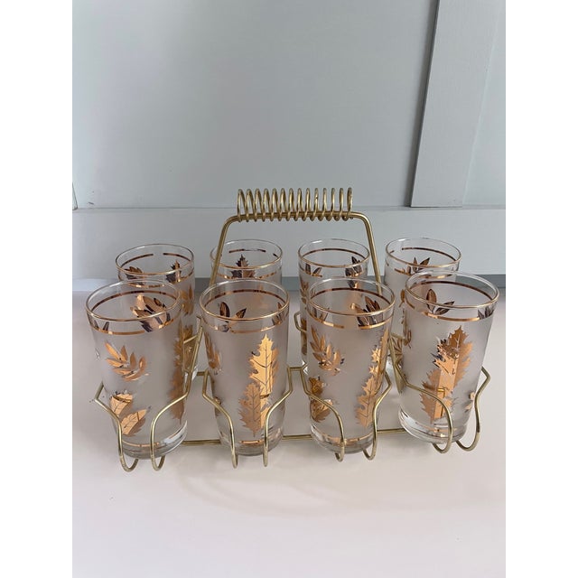 Elegant vintage set of eight Collins gold glasses on a frosted background from Libbey Glass Company. Creator was Fred...