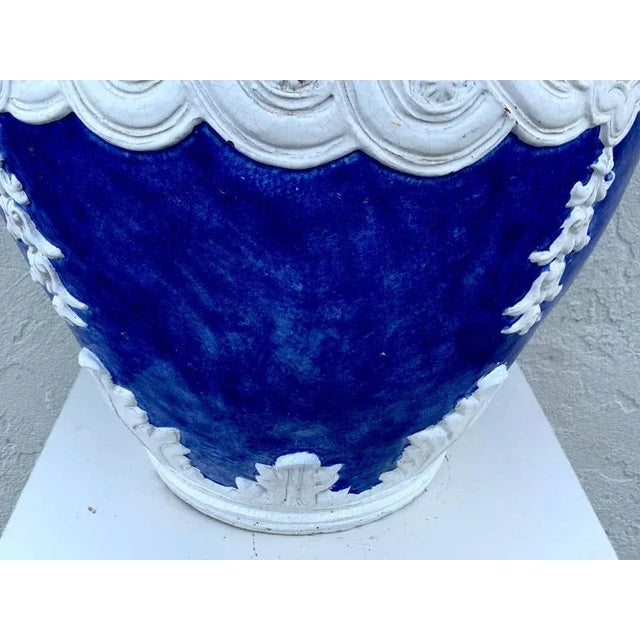 Italian blue and white Della Robbia style jardinière, Provenance, Celine Dion Of large scale the two handled urn with...