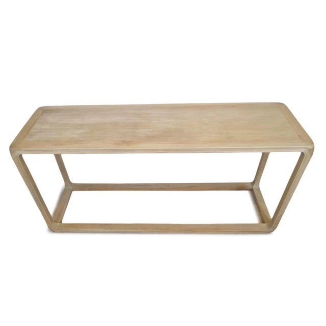 Salvaged elm wood vintage console with sanded white washed finish. Simple classic design a perfect addition for a wide...