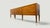 This elegant Italian sideboard designed by Paolo Buffa, represents a refined synthesis of neoclassical inspiration and...