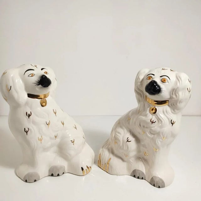 Porcelain King Charles Spaniels, 1960s, Set of 2, in Very Good conditions. Designed before 1890 This piece has an...