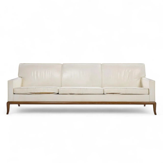 Robsjohn Gibbings for Widdicomb Mid Century Walnut Sofa This sofa measures: 92 wide x 34 deep x 31 inches high, with a...