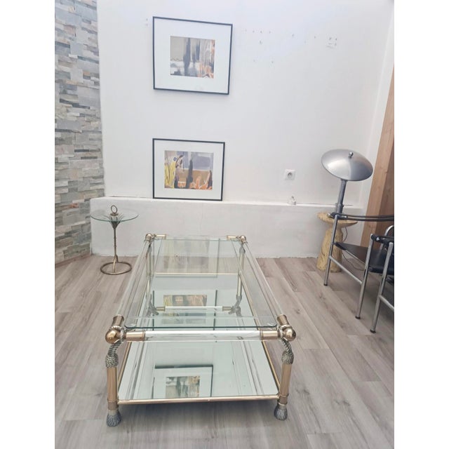 Very beautiful and rare Hollywood Regency coffee table by Curvasa. Spain, 1970s. Brass and methacrylate frame. Details:...