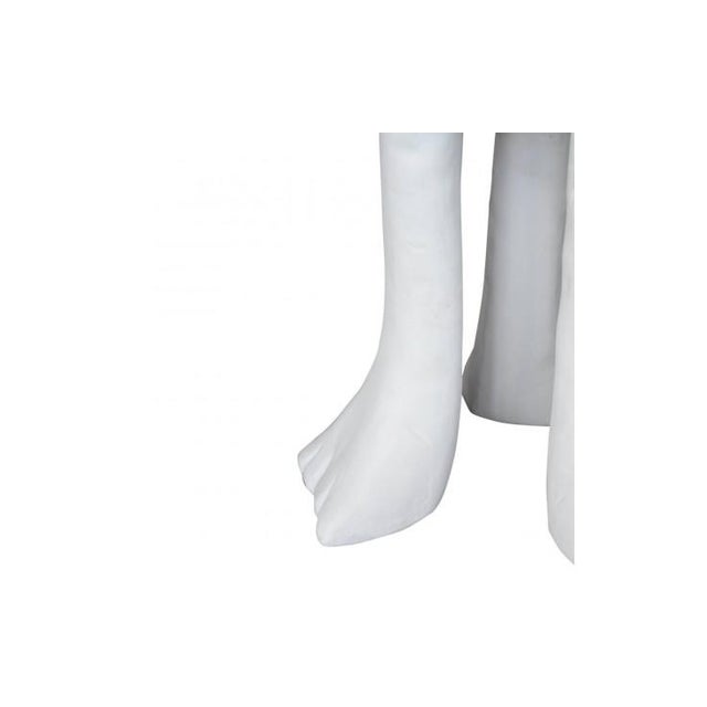 Both sculpture and furniture, the small African table from Sutherland Furniture designed by John Dickinson (20th century)...