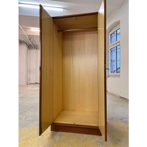 This wardrobe, model 2994, manufactured by rt ​​Möbel, is a high-quality piece of furniture from Germany that combines...
