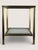 Side table in the style of Pierre Vandel's Parisian designs from the 1970s. Beveled white glass top. Black and gold...